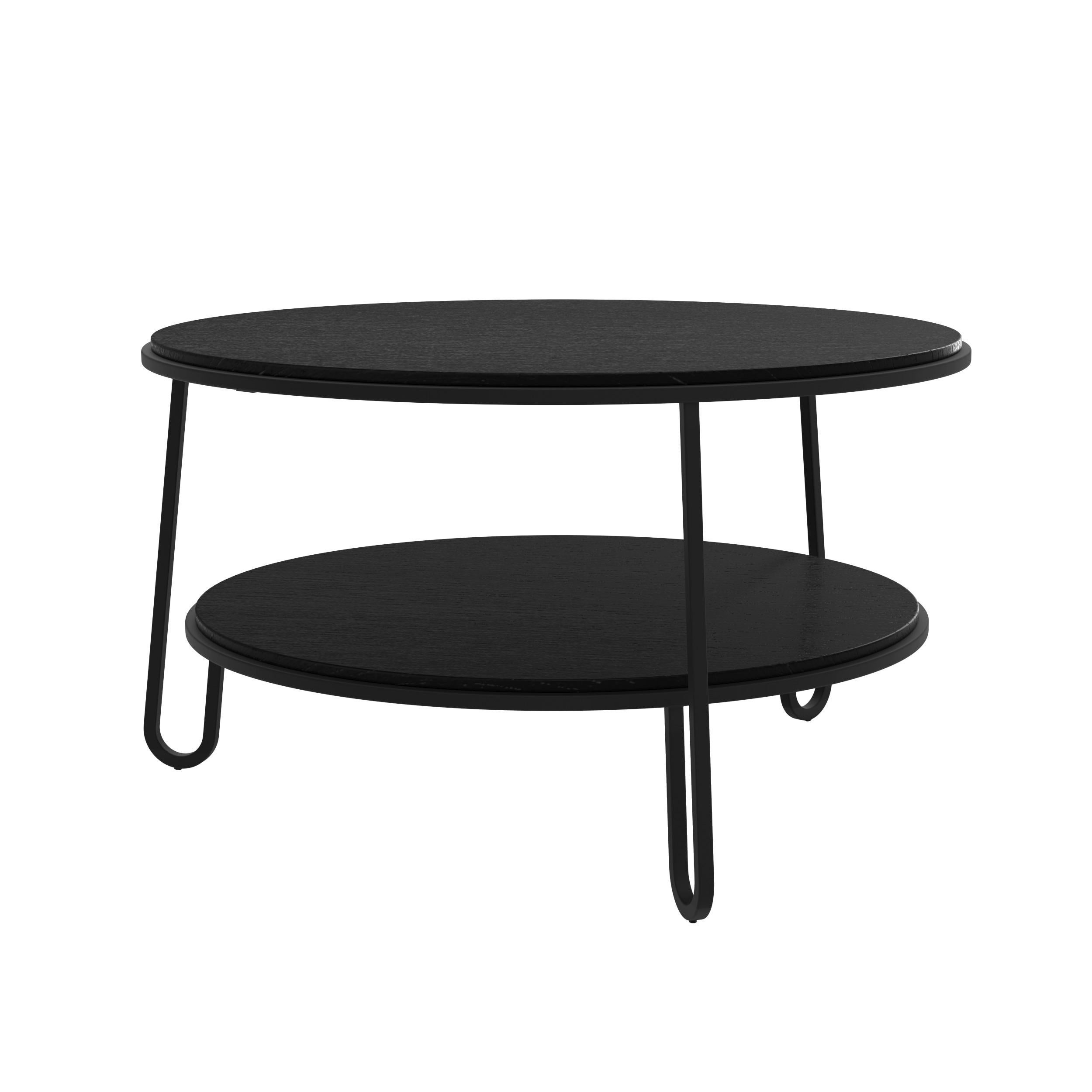 Table basse Eugénie en chêne teinté noir et métal 70 par HARTO
Dimensions : L 70 x P 70 x H 41 cm : L 70 x P 70 x H 41 cm. 
MATERIAL : Contreplaqué plaqué bois, métal peint.
Poids : 9.5 kg

La table basse ronde 70cm Elegénie est aérienne, sa