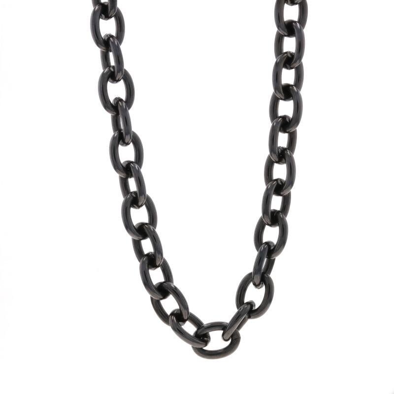 Metal Content: Black Stainless Steel & 14k Yellow Gold

Chain Style: Cable
Necklace Style: Chain
Fastening Type: Lobster Claw Clasp

Measurements
Length: 20