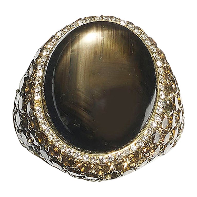 Ring mit schwarzem Sternsaphir und Diamant
