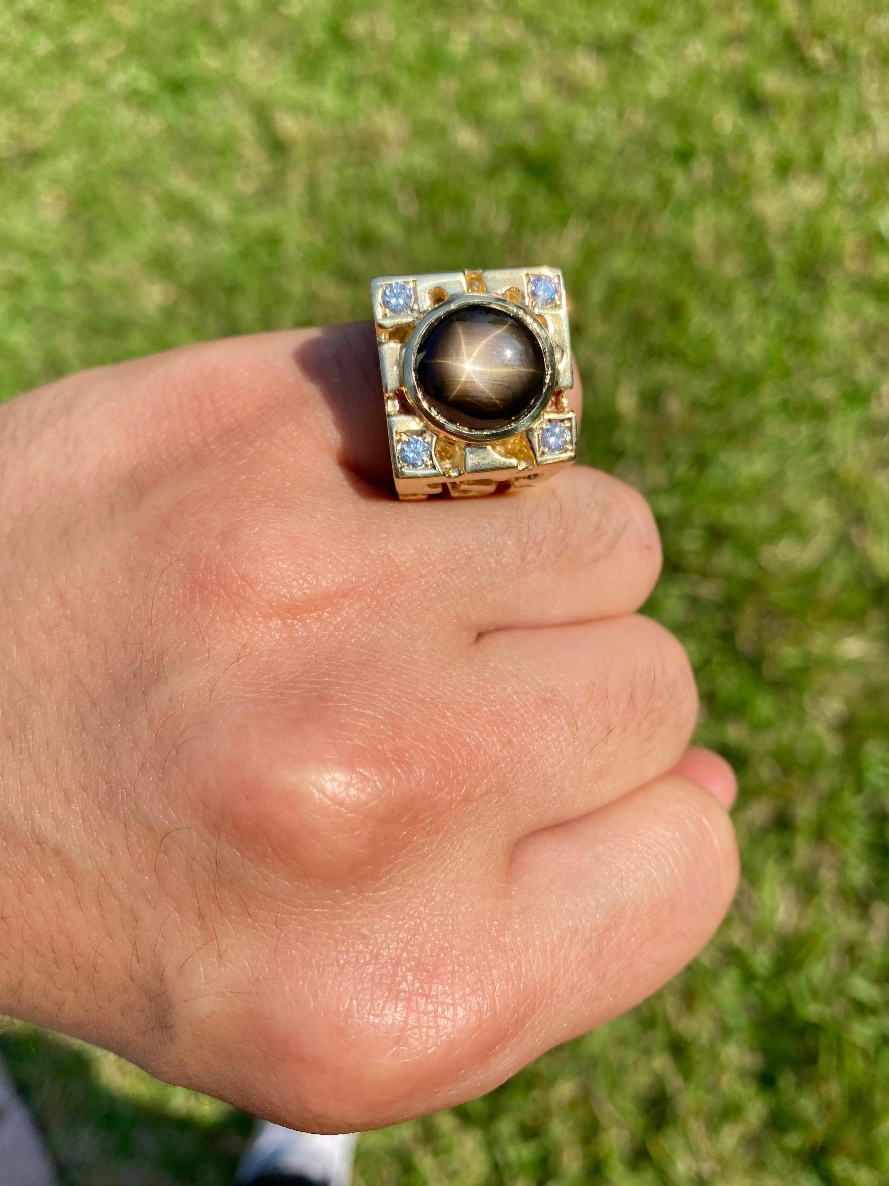 Gorgeous black star sapphire mens ring in textured 14k solid gold. The ring's design is extremely clever and executed to perfection. This ring design is known as a 