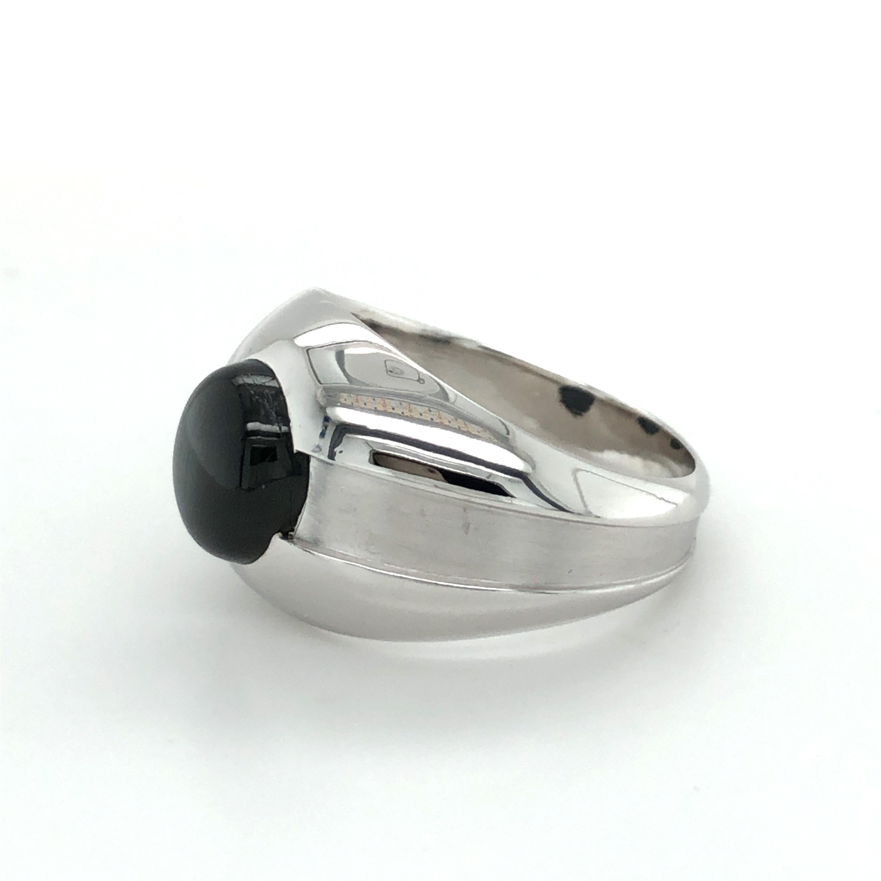 Cabochon Black Star Sapphire Ring in 18 Karat White Gold by Gübelin For Sale