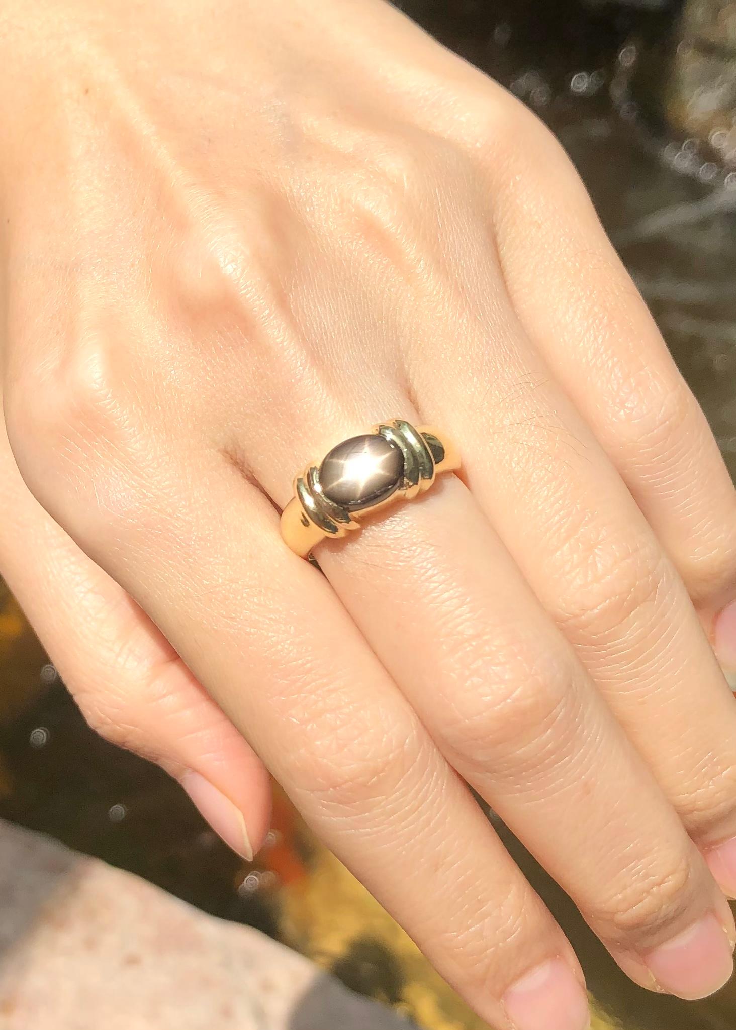 Black Star Sapphire Ring Set in 18 Karat Gold Settings For Sale 1