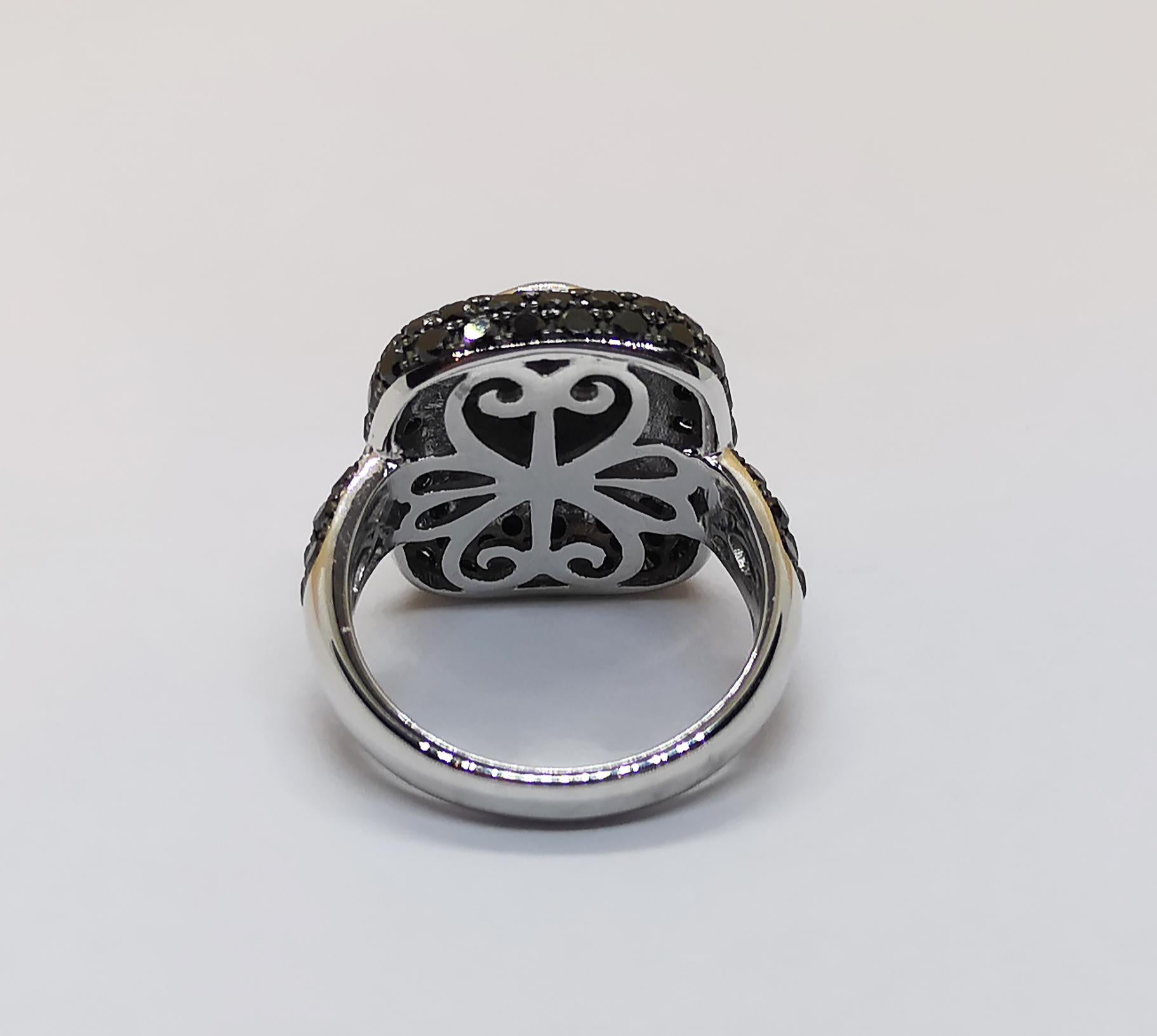 Black Star Sapphire 6.44 carats with Black Diamond 2.69 carats Ring set in 18 Karat White Gold Settings 


Width: 2.0 cm
Length: 2.3 cm 
Ring Size: 56

