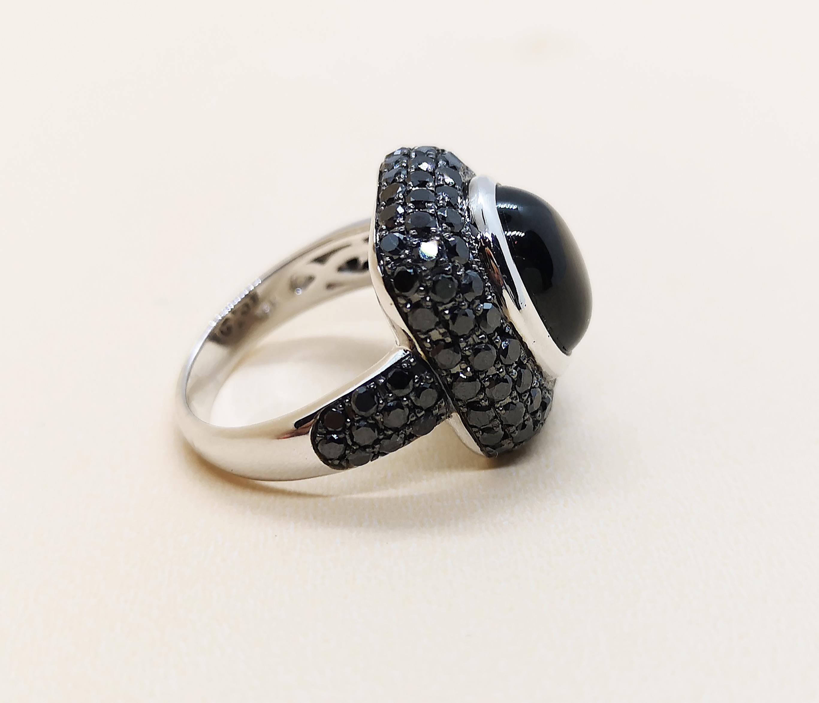 Cabochon Black Star Sapphire with Black Diamond Ring Set in 18 Karat White Gold Settings