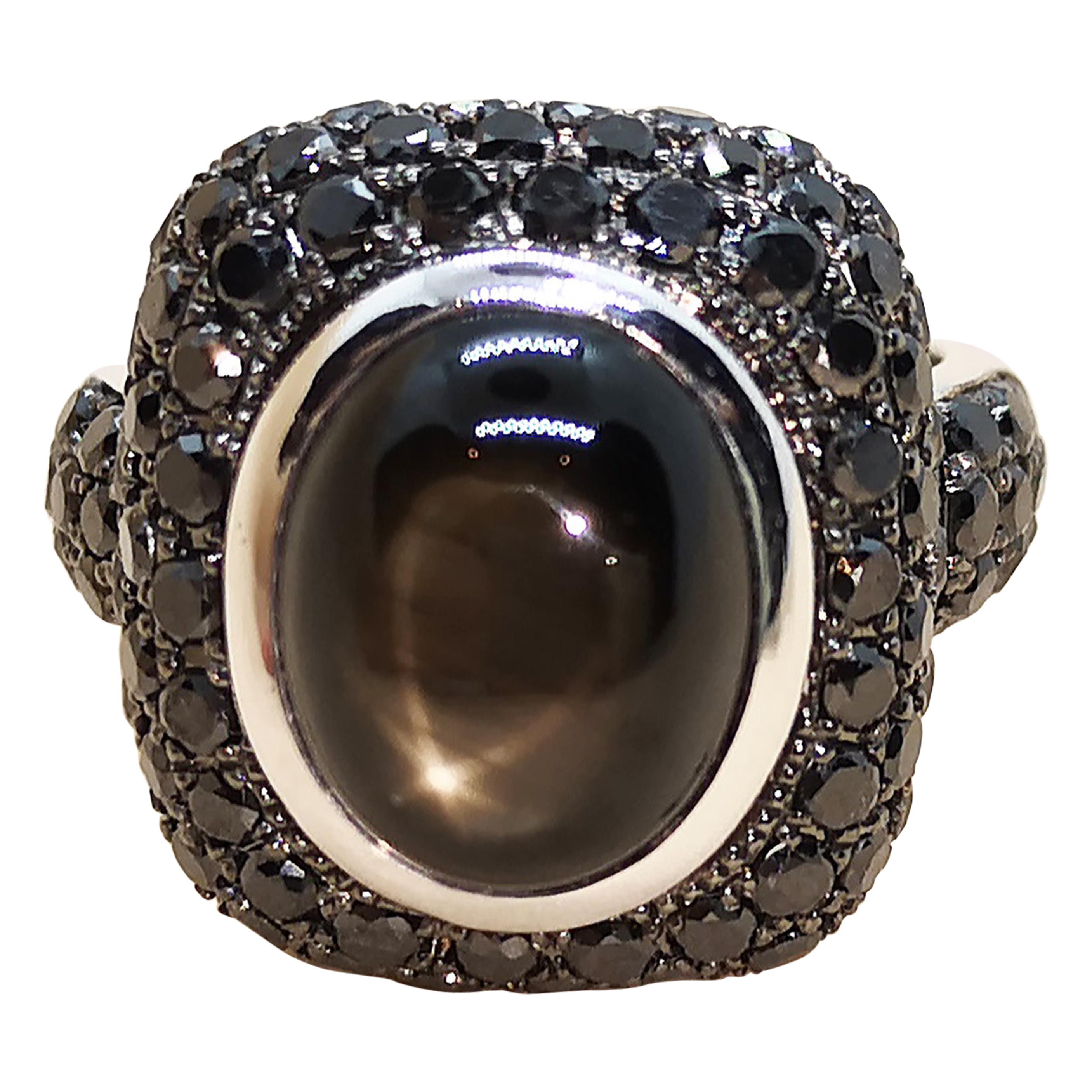 Black Star Sapphire with Black Diamond Ring Set in 18 Karat White Gold Settings