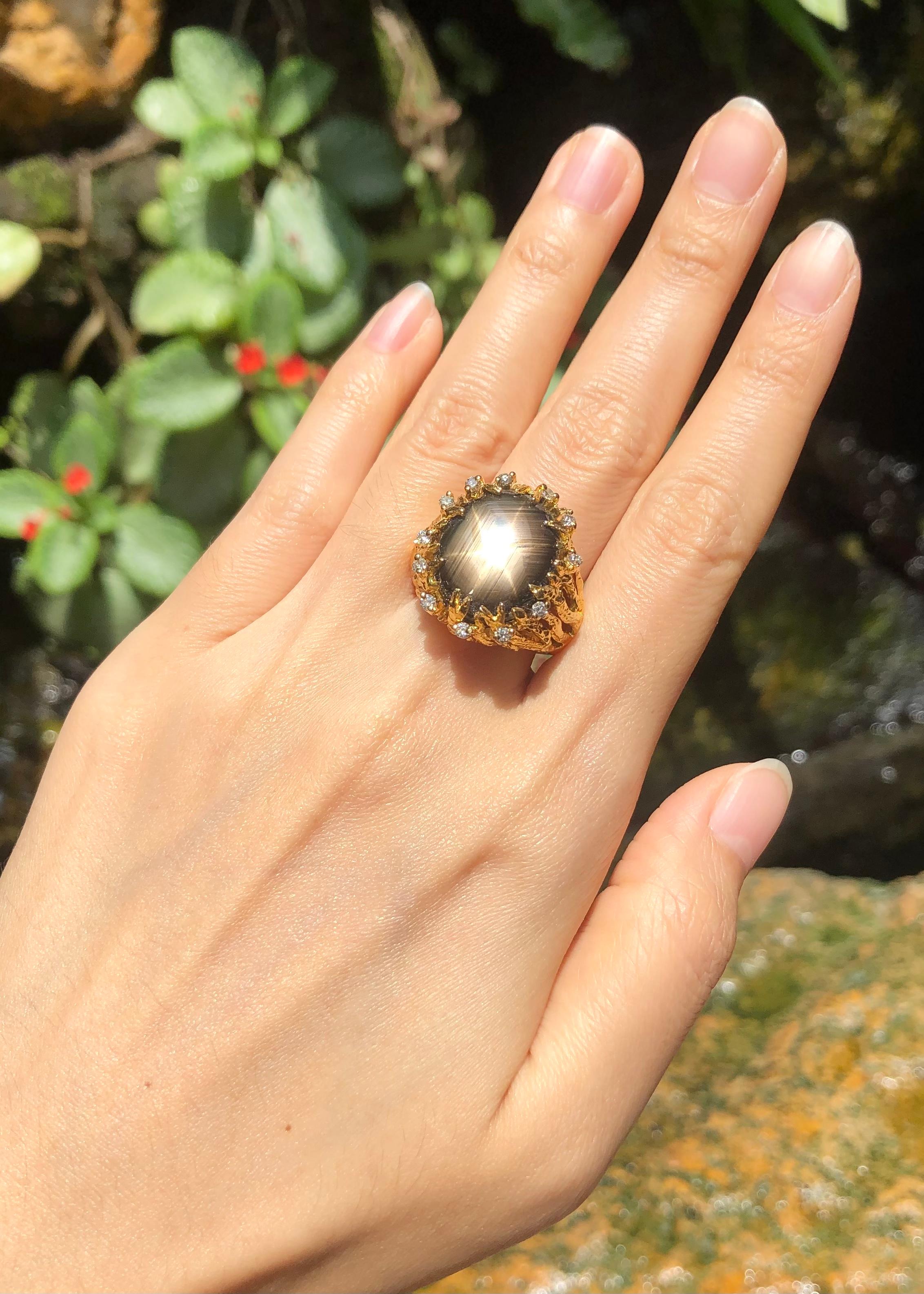 Contemporary Black Star Sapphire with Brown Diamond Ring Set in 18 Karat Gold Settings For Sale