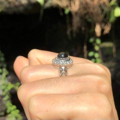 Black Star Sapphire with Cubic Zirconia Ring set in Silver Settings