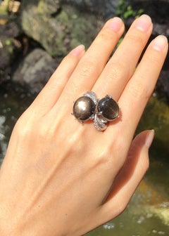 Black Star Sapphire with Cubic Zirconia Ring set in Silver Settings