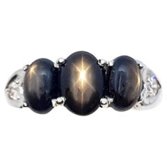 Black Star Sapphire with Cubic Zirconia Ring set in Silver Settings