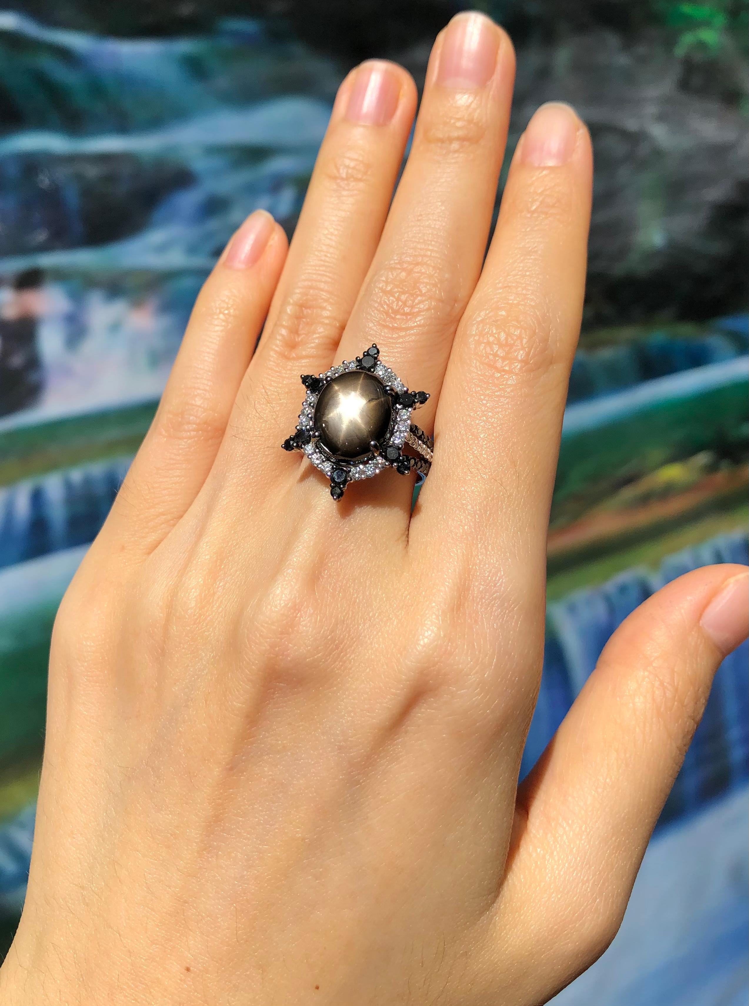Black Star Sapphire 10.49 carats with Diamond 0.45 carat and Black Diamond 0.88 carat Ring set in 18 Karat White Gold Settings

Width:  1.8 cm 
Length: 2.4 cm
Ring Size: 54
Total Weight: 10.53 grams


