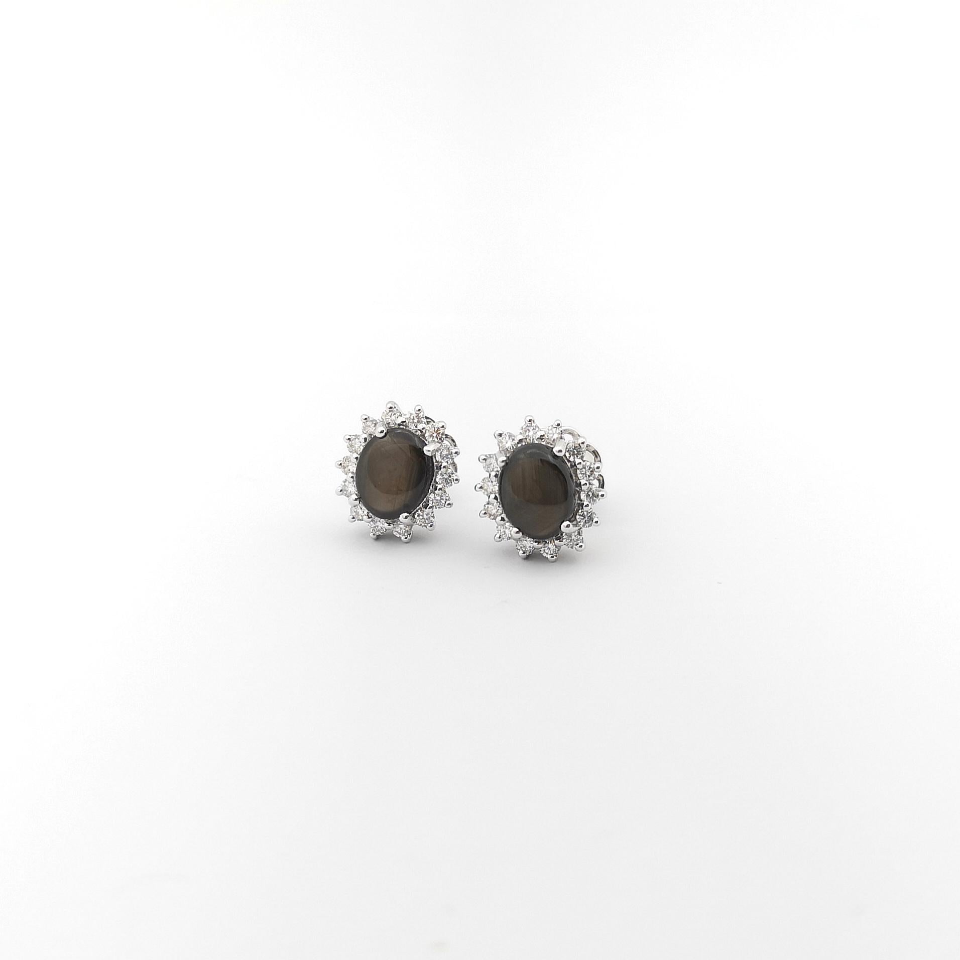 Cabochon Black Star Sapphire with Diamond Earrings set in 14K White Gold Settings For Sale