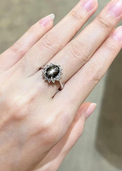 Black Star Sapphire with Diamond Ring set in 14K White Gold Settings