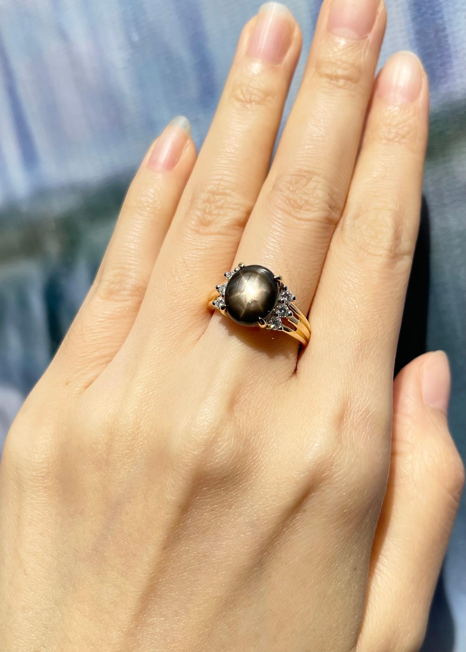 Black Star Sapphire 4.0 carats with Diamond 0.30 carat Ring set in 18K Gold Settings

Width:  1.4 cm 
Length: 1.0 cm
Ring Size: 53
Total Weight: 7.18 grams

