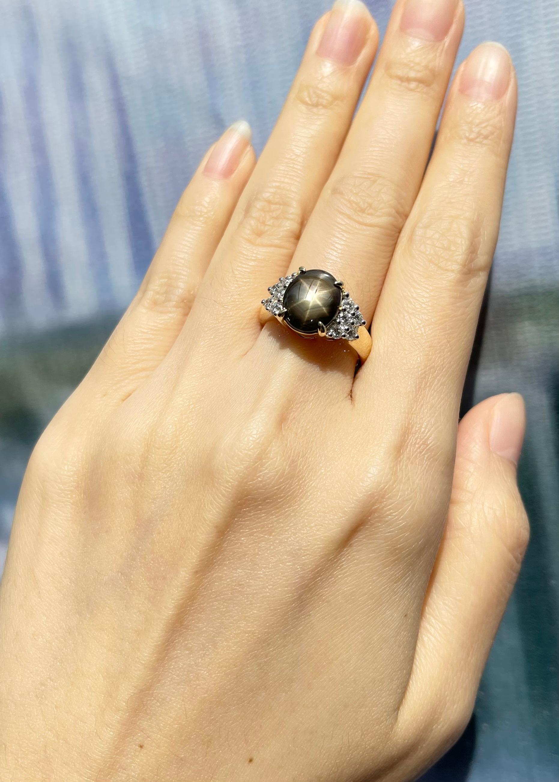Black Star Sapphire 4.43 carats with Diamond 0.49 carat Ring set in 18K Gold Settings

Width:  1.6 cm 
Length: 1.0 cm
Ring Size: 53
Total Weight: 7.59 grams

