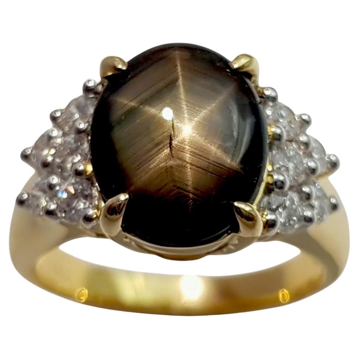 Black Star Sapphire with Diamond Ring set in 18K Gold Settings
