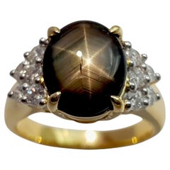 Black Star Sapphire with Diamond Ring set in 18K Gold Settings