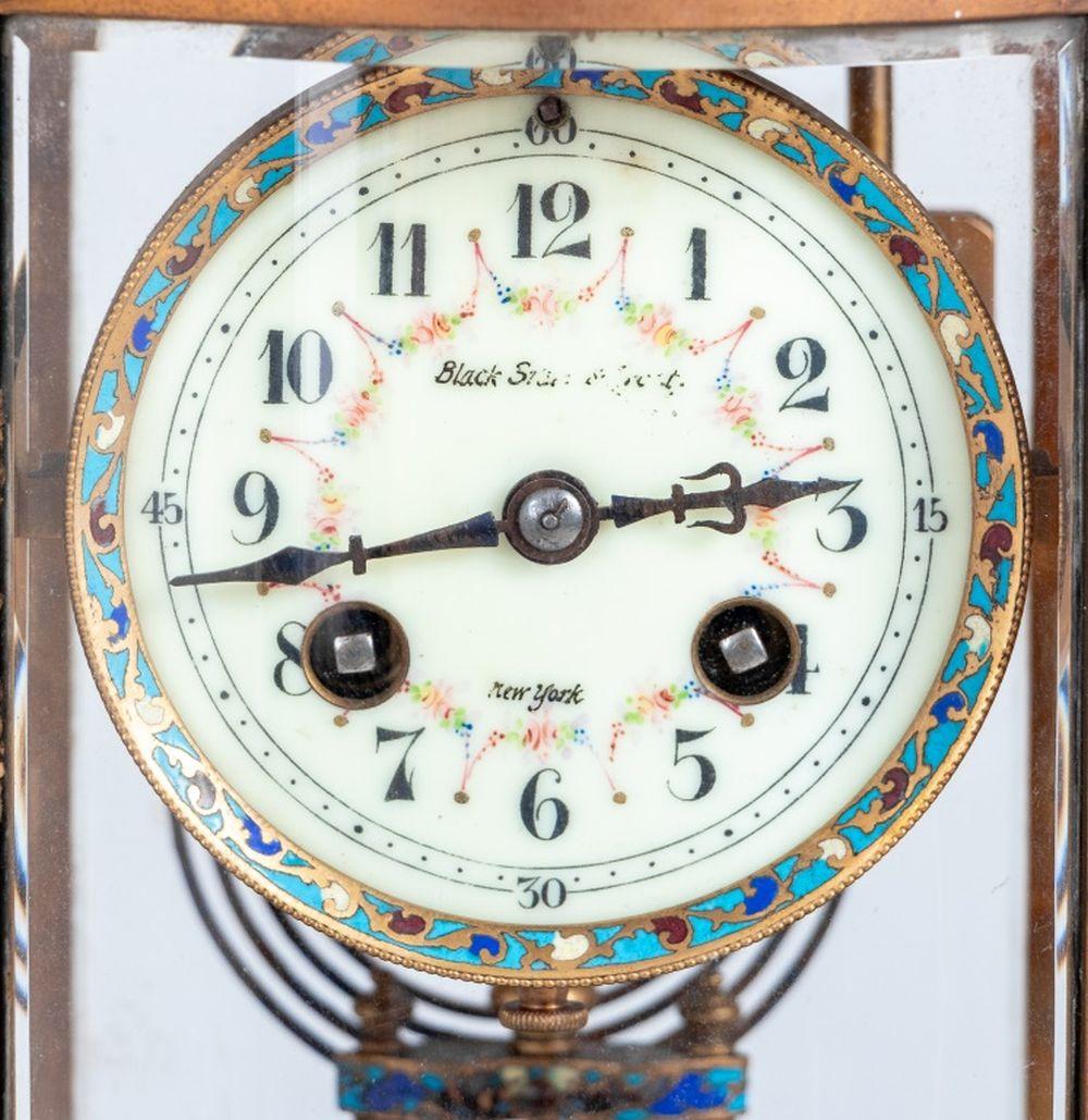 Black, Starr, and Frost, New York, Oval Gilt Brass and Champleve Cloisonne Enamel Clock, early 20th century, the circular white enamel painted dial, the movement strike on gong, with a mercury compensated pendulum, stamped 