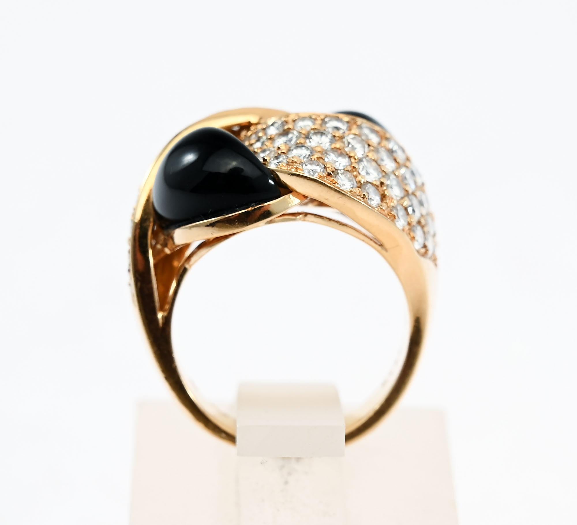 Unusual diamond and black onyx ring by Black, Starr and Frost in which the two gems appear to be interlaced. The ring has round brilliant diamonds that weigh approximately 3.2 carats. The stones are VS quality.  Black, Starr and Frost is the oldest