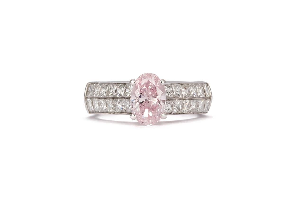 We are pleased to offer this Black, Starr & Frost GIA Certified Natural Fancy Pink Oval Diamond Ring 2.30ctw. This beautiful custom Black, Starr & Frost ring features a GIA certified 1.11ct I1 Natural Fancy Pink Oval Modified Brilliant cut center