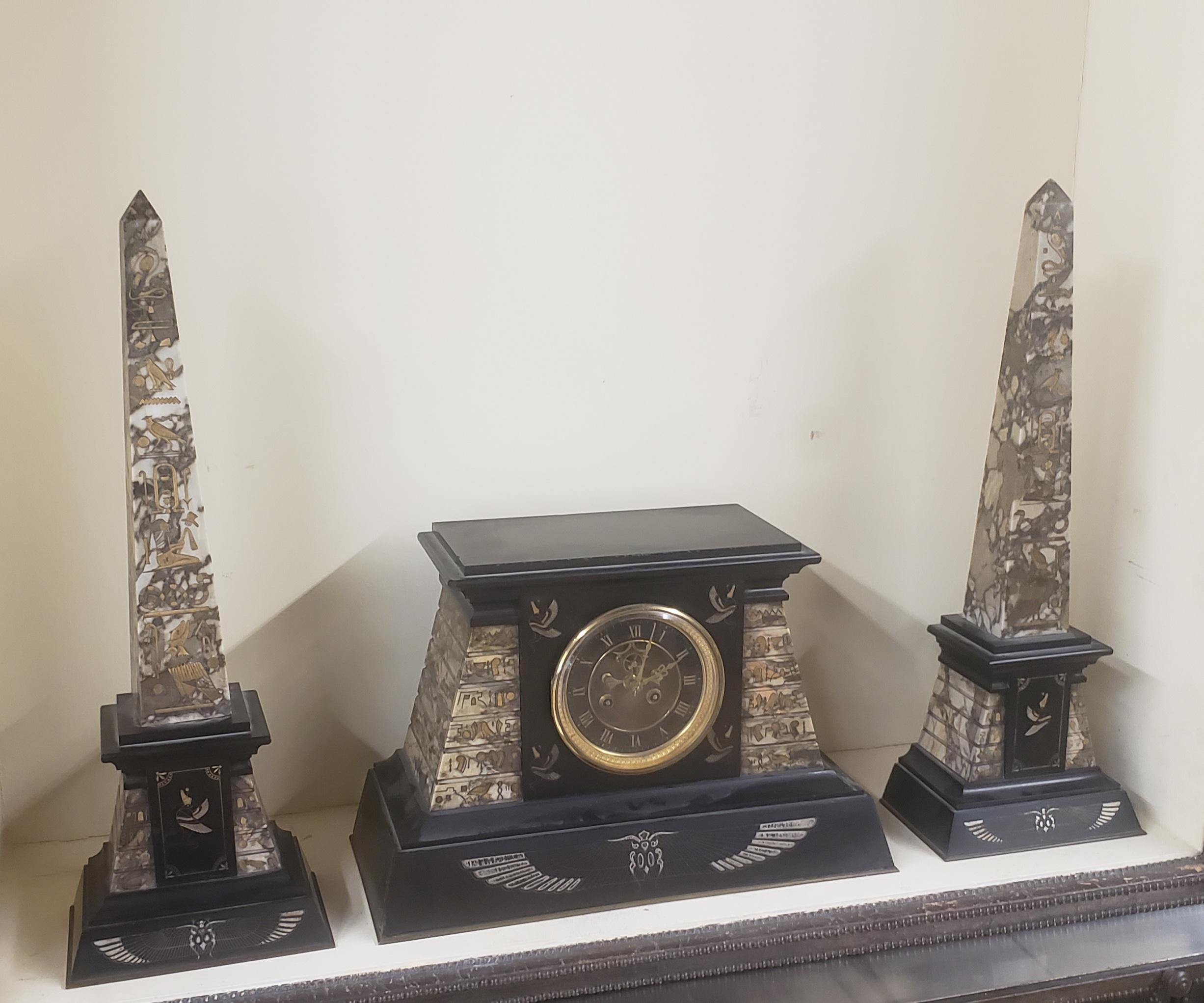 An original, very rare Egyptian revival Mantle Clock and Obelisks garniture set by the very famous Black Starr & Frost, the oldest jewelry company in America founded in 1810. Garniture set dates from the 1860s and maker's name engraved underneath.