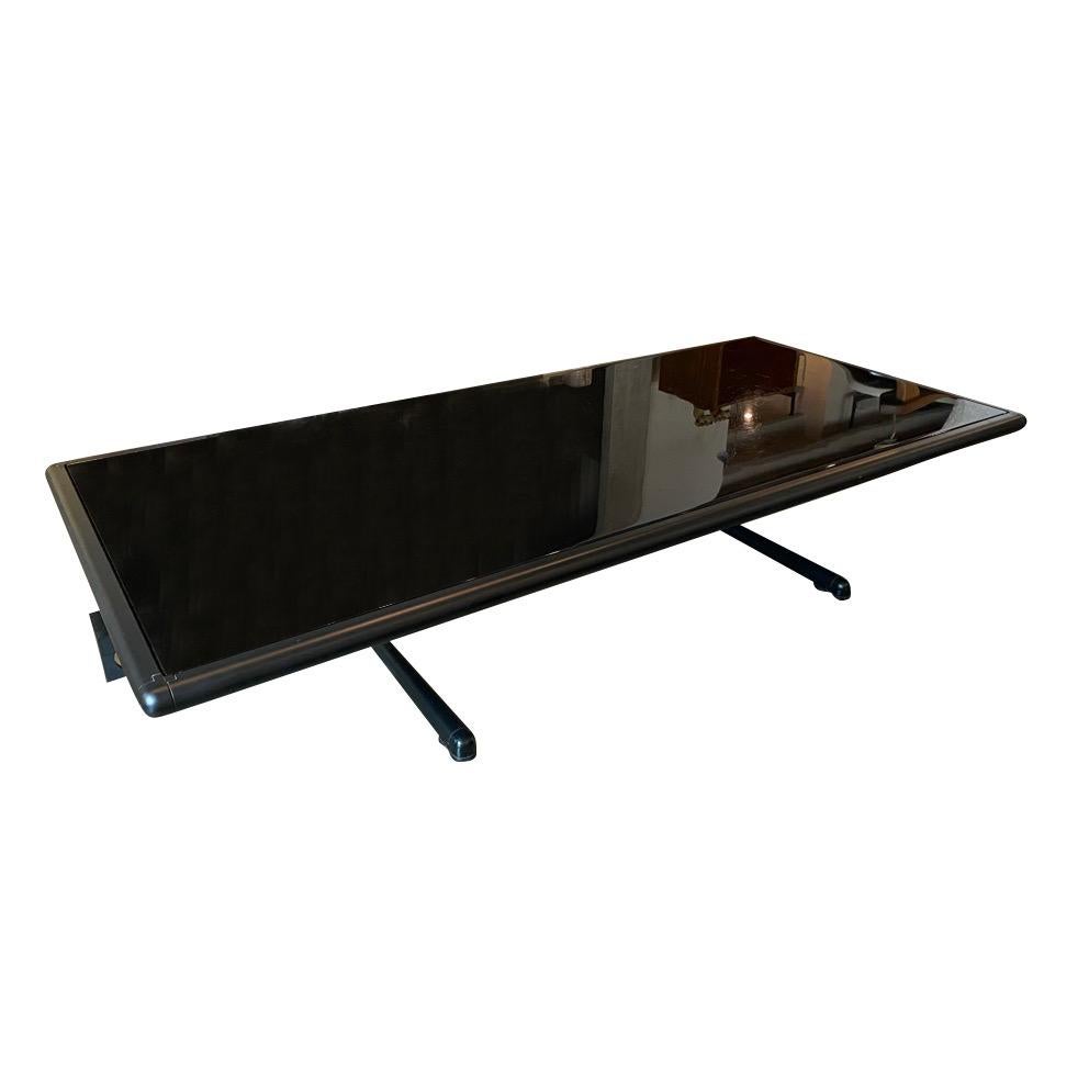 From his Ouverture series for Poltrona Frau, cocktail table by Pierluigi Cerri. Black steel with polished black stone top. Stone is reminiscent of polished absolute black granite. A handsome table in mid-century modern to post-modern styling. Italy,