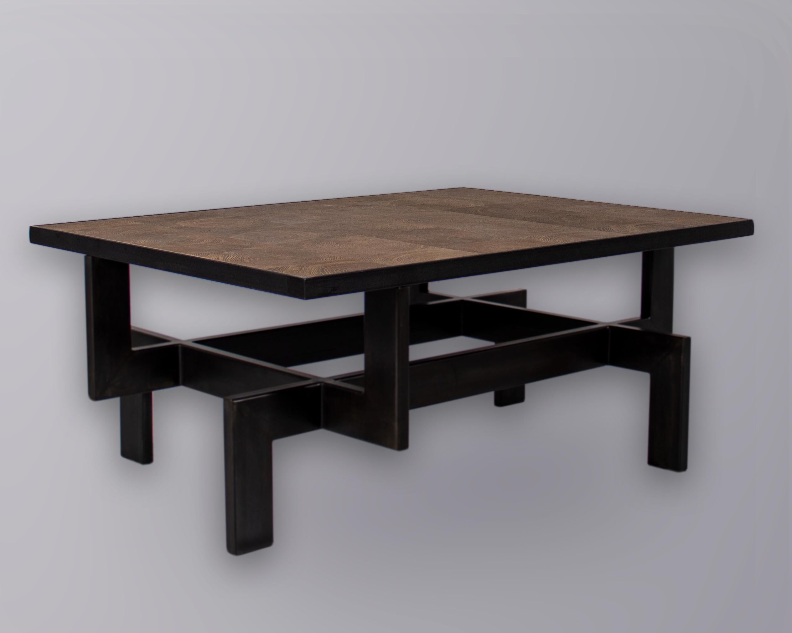 Black steel geometric shape coffee table base with natural oak top.

Designed by Brendan Bass for the Vision and Design Collection, by using high quality materials and textures. All materials are sourced from local vendors throughout the state of