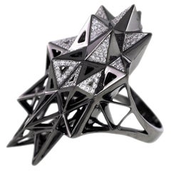 Bague étoilée noire en or et diamants