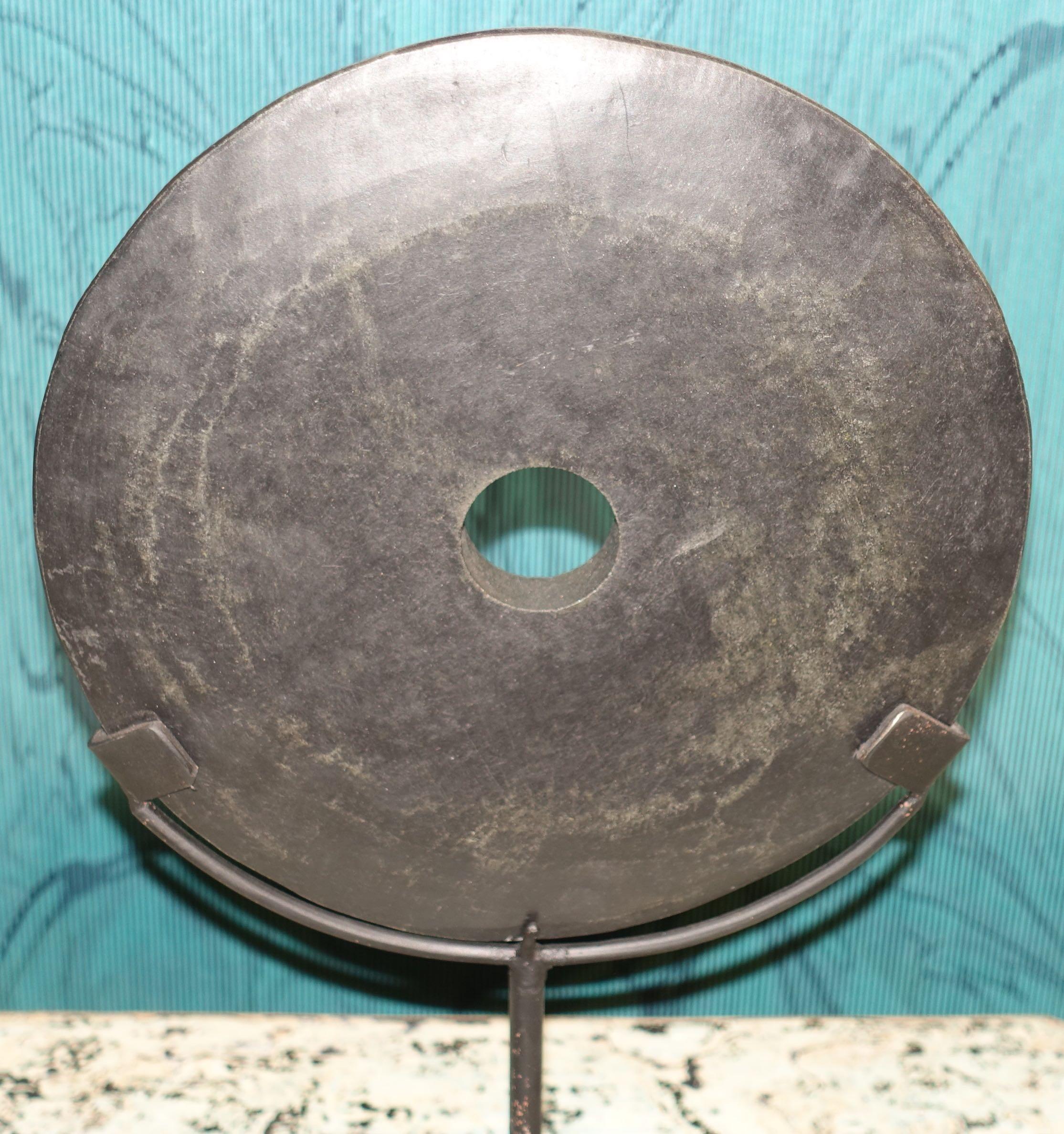 Contemporary Chinese black stone disc sculpture
Stand measures 5