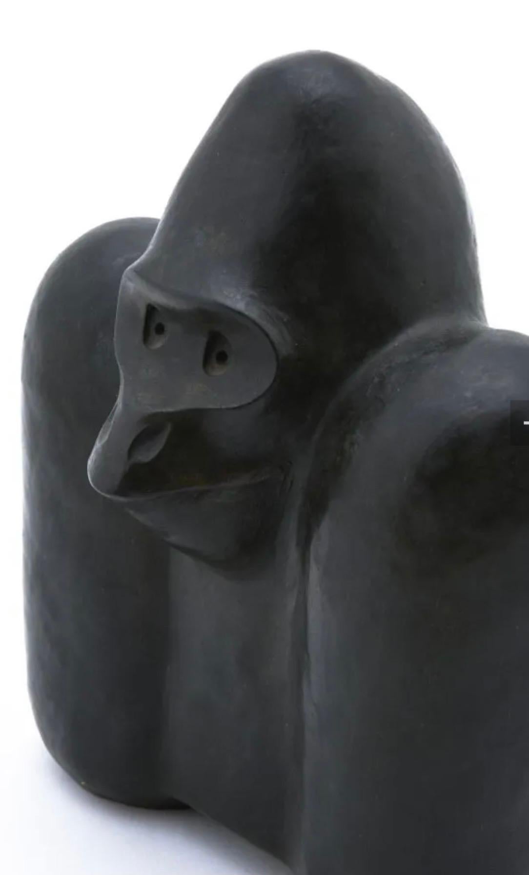 A black stone stylized monkey anonymous work.