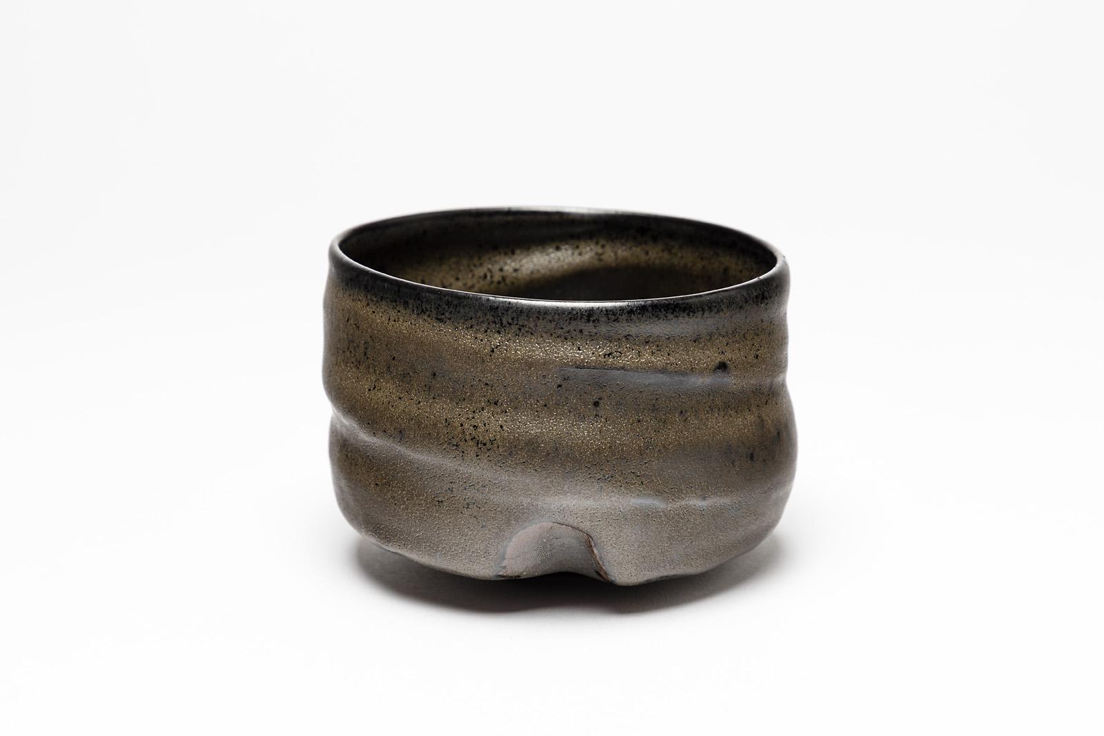 Lukas Richarz

Contemporary handmade ceramic bowl by the French artist.

Elegant black stoneware ceramic glaze color.

Original perfect condition

Realized in France, circa 2019

Signed under the base

Measures: Height 8cm, large 11cm.