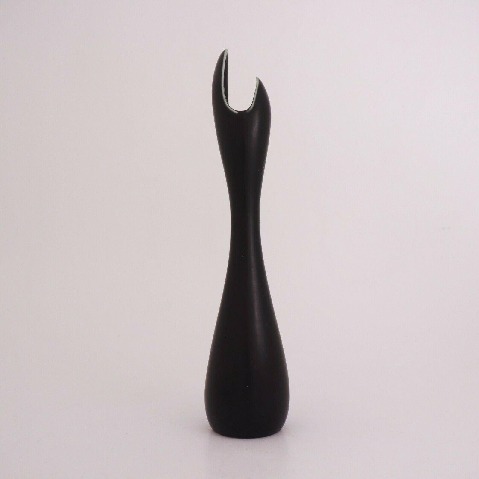 A black vase designed by Gunnar Nylund at Rörstrand of model Caolina, the vase is 31.5 cm high and it is in mint condition.

Gunnar Nylund was born in Paris 1904 with parents who worked as sculptors and designer so he really soon started hos own