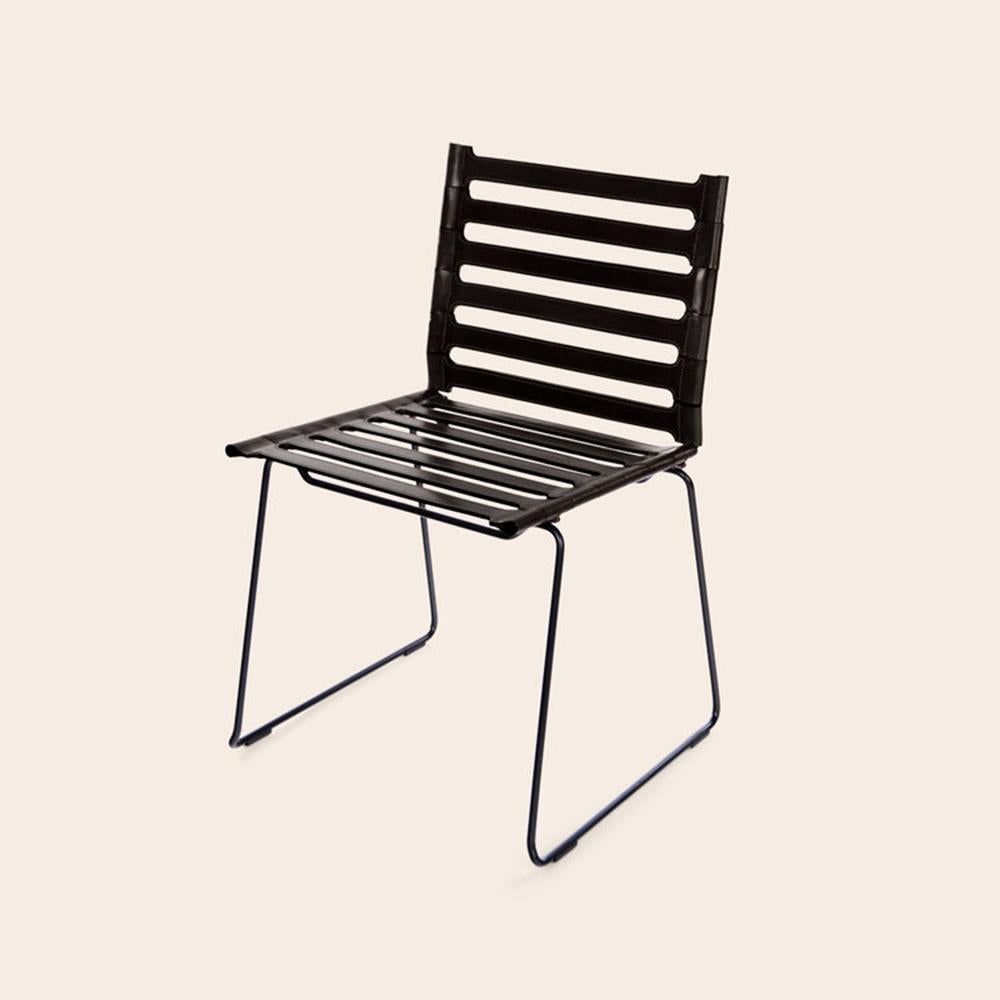 Black Strap chair by Ox Denmarq
Dimensions: D 45 x W 45 x H 78.5 cm
Materials: Leather, Black Powder Coated Steel
Also Available: Different colors available.

OX DENMARQ is a Danish design brand aspiring to make beautiful handmade furniture,