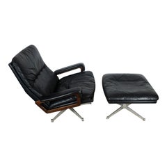 black STRÄSSLE KING CHAIR mit ottoman andré vandenbeuck