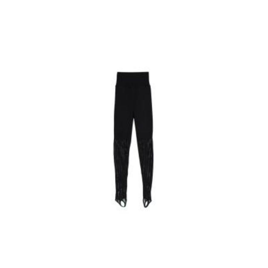 Alaia Black Stretch Knit Wave Stirrup Leggings
 

 - Mid weight knit body 
 - Fine knit bottom panel 
 - High waisted ribbed knit panel
 - Fitted 
 - Stirrup leg detail 
 

 Materials: 
 75% Viscose 
 13% Polyester 
 2% Elastane 
 

 Made in Italy 
