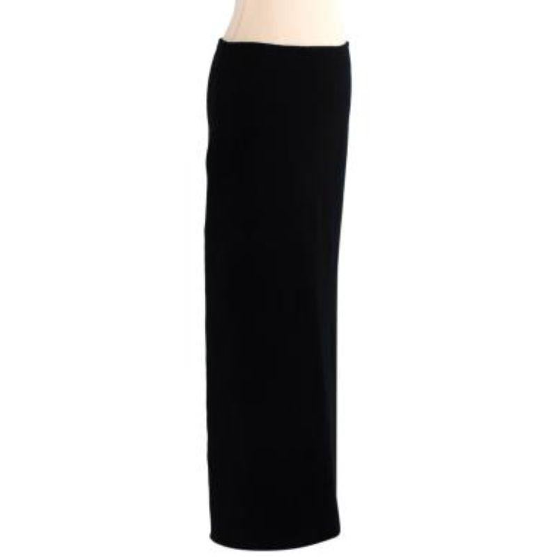 Vetements black stretch-wool maxi skirt
 
 - Maxi length woolen skirt with a deep slit at the back from the 2016 A/W womenswear collection 
 - Mid-weight stretchy material 
 - Woven detailing along the seams 
 
 Materials 
 100% Wool 
 
 Made in