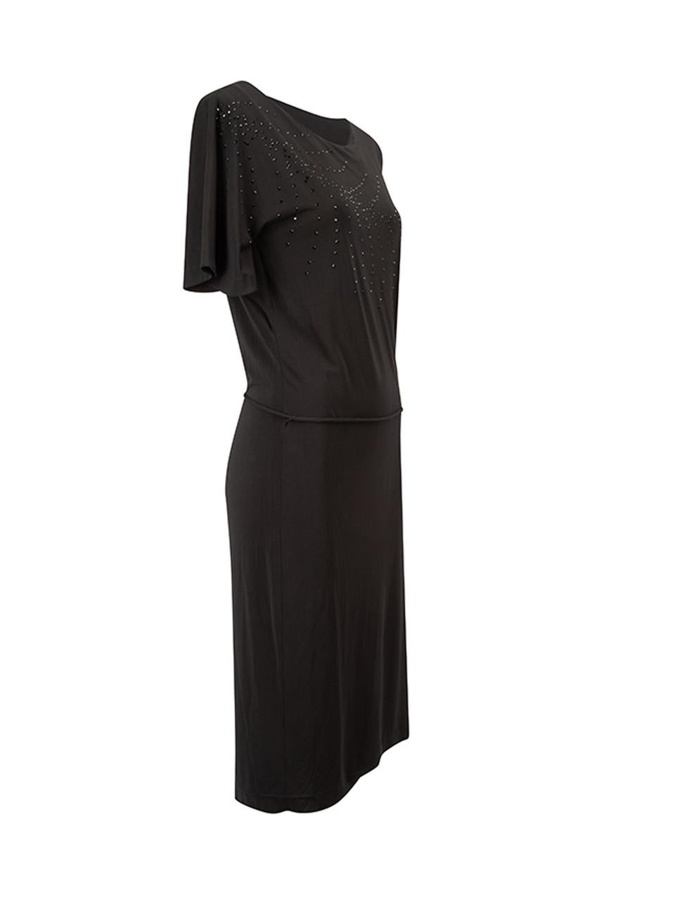 CONDITION is Very good. Minimal wear to dress is evident. Minimal wear to the outer fabric and there are faint marks around the neckline and sleeves on this used Escada designer resale item.



Details


Black

Viscose

Studded

Loose fit

Knee
