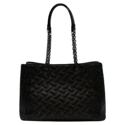 Black studded & Intrecciato leather tote bag For Sale