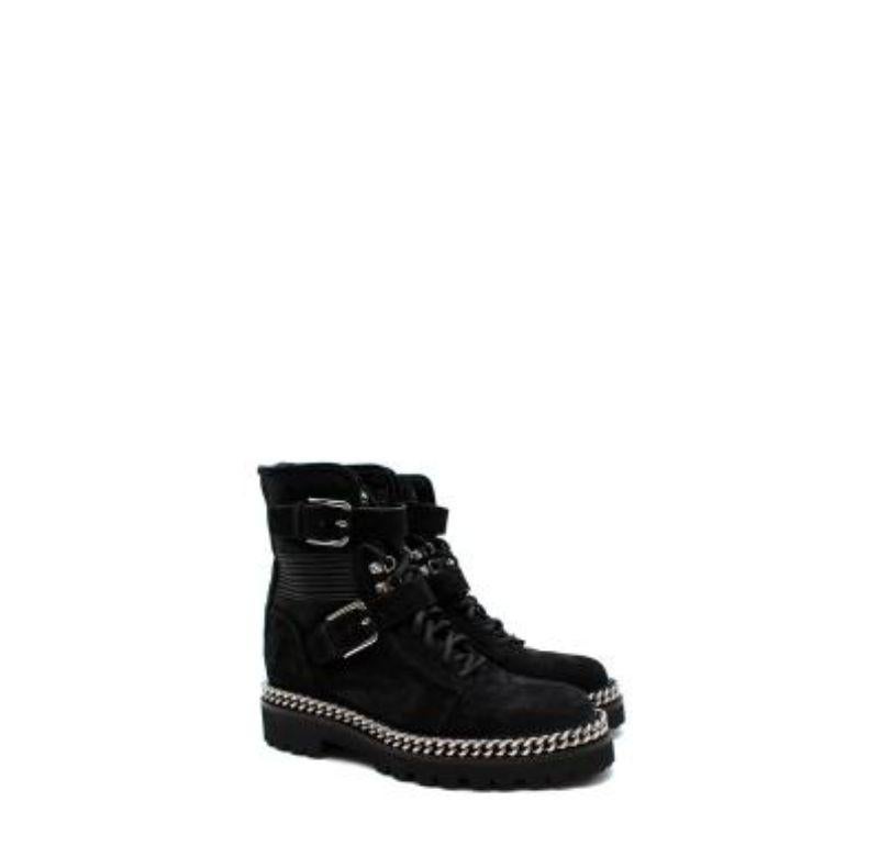 Balmain Black Suede Chain Trim Boots
 

 - Silver tone metallic hardware 
 - All over suede body 
 - Chunky rubber sole 
 - Black laces with double strap buckle fastening 
 - Heel exposed chunky zip fastening 
 

 Materials: 
 Suede 
 

 Made in