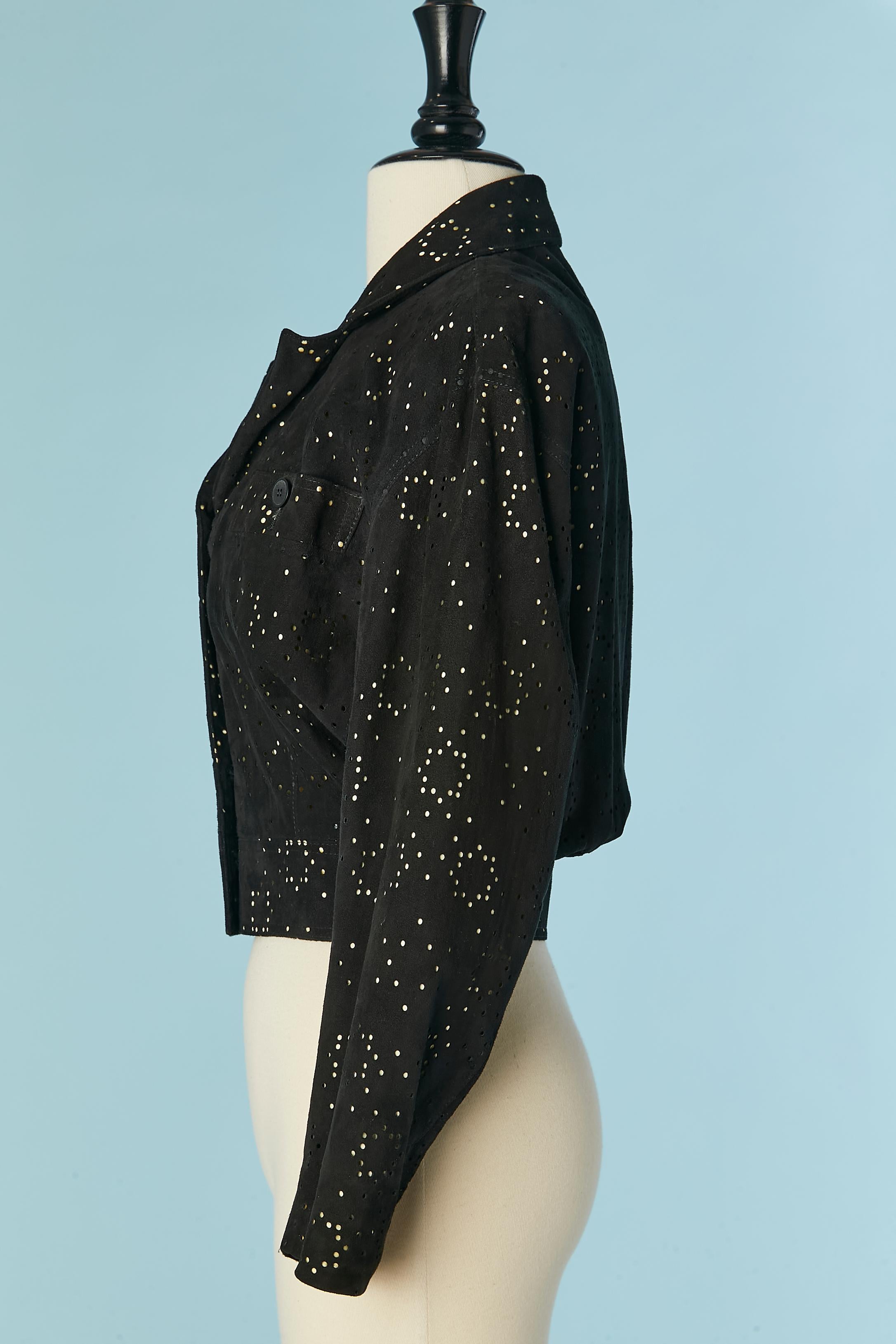 Black suede jacket with perforated laser pattern and pale yellow lining ALAIA 1