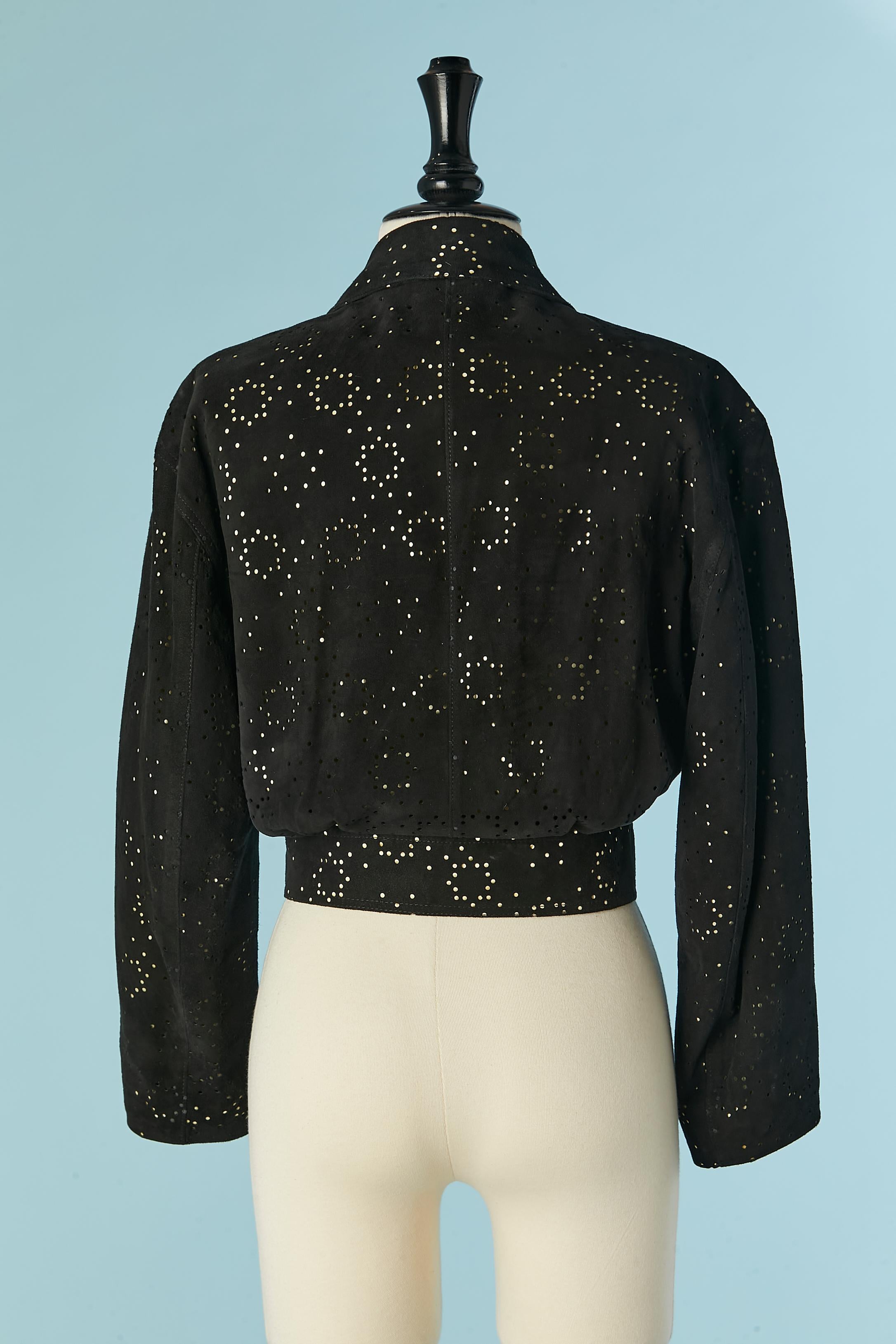 Black suede jacket with perforated laser pattern and pale yellow lining ALAIA 2