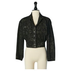 Black suede jacket with perforated laser pattern and pale yellow lining ALAIA