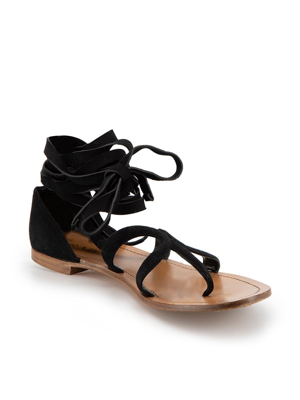 CONDITION is Very good. Hardly any visible wear to sandals is evident on this used Prada designer resale item.



Details


Black

Suede

Flat

 Strappy

Ankle/Calf tie fastening





Made in Italy 

 

Composition

Suede and Leather



Size &