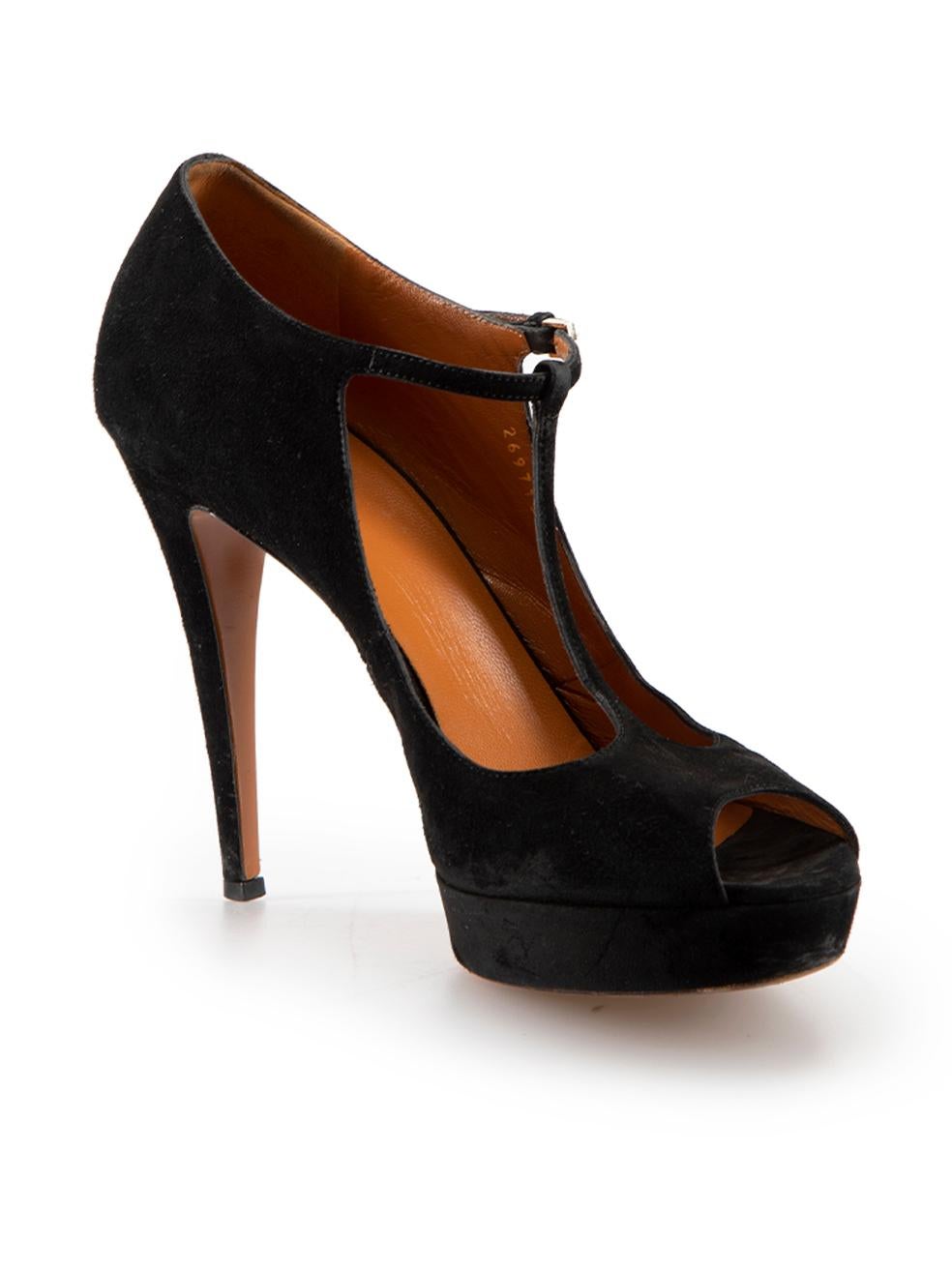 CONDITION is Good. General wear to shoes is evident. Moderate signs of wear to both sides and heels of both shoes on this used Gucci designer resale item. These shoes come with original box.



Details


Black

Suede

T bar heels

Peep toe

Platform