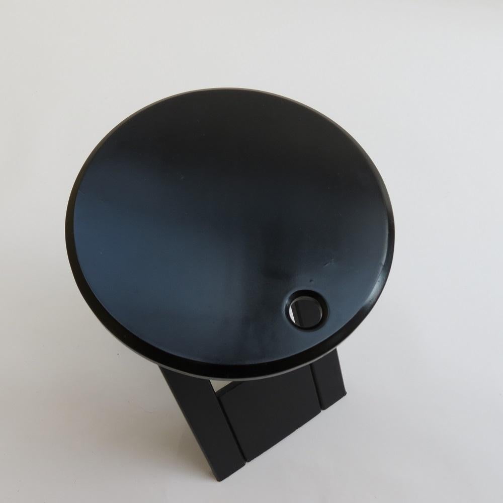 Folding Suzy stool, designed by Adrian Reed for Princes Design Works. Originally designed in 1984, this stool dates from the late 1980s. Original black finish. Folds flat when not in use.

In good vintage condition with minimal signs of