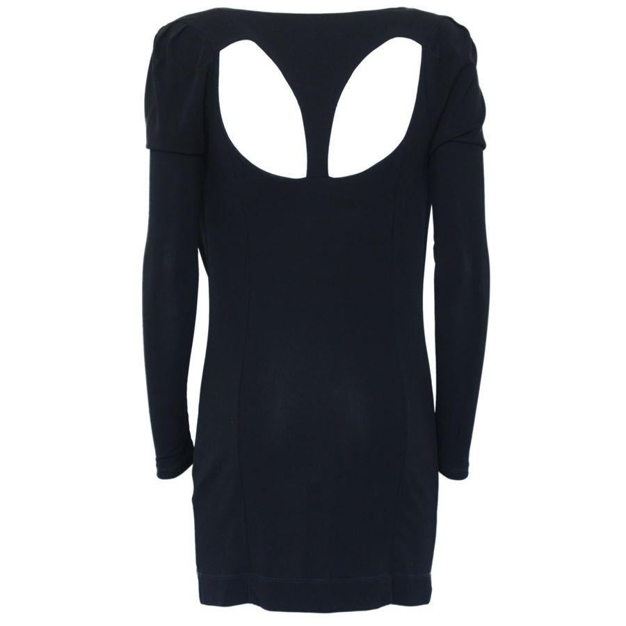 Viscose Black color Long sleeves Overtures on the back Lenght from shoulder cm 82 (32.3 inches)
