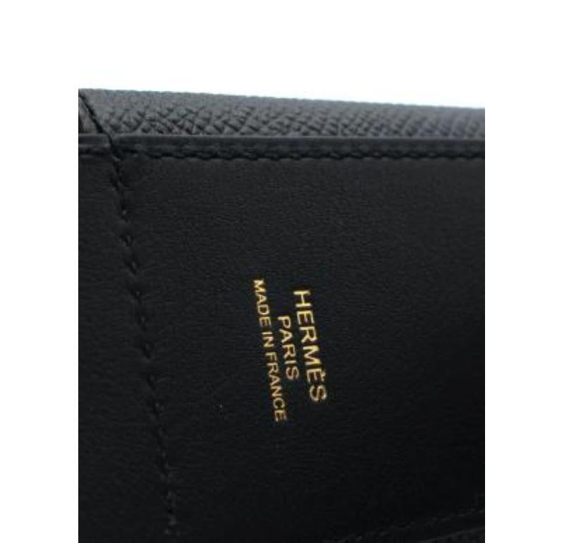 Hermes Black Kelly Pocket Bag Strap 
 
 Bag strap in Swift and Epsom calfskin with card holder and gold plated hardware
 
 The Kelly pocket combines a cardholder and leather shoulder strap, and style with functionality
 
 Made in France