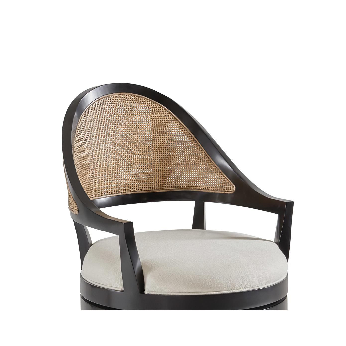 Featuring a sleek ebony-painted frame, this stool is designed with 3/4 swivel functionality for effortless movement. The cane backing adds natural texture and charm, while the neutral linen upholstery provides a soft, comfortable seating