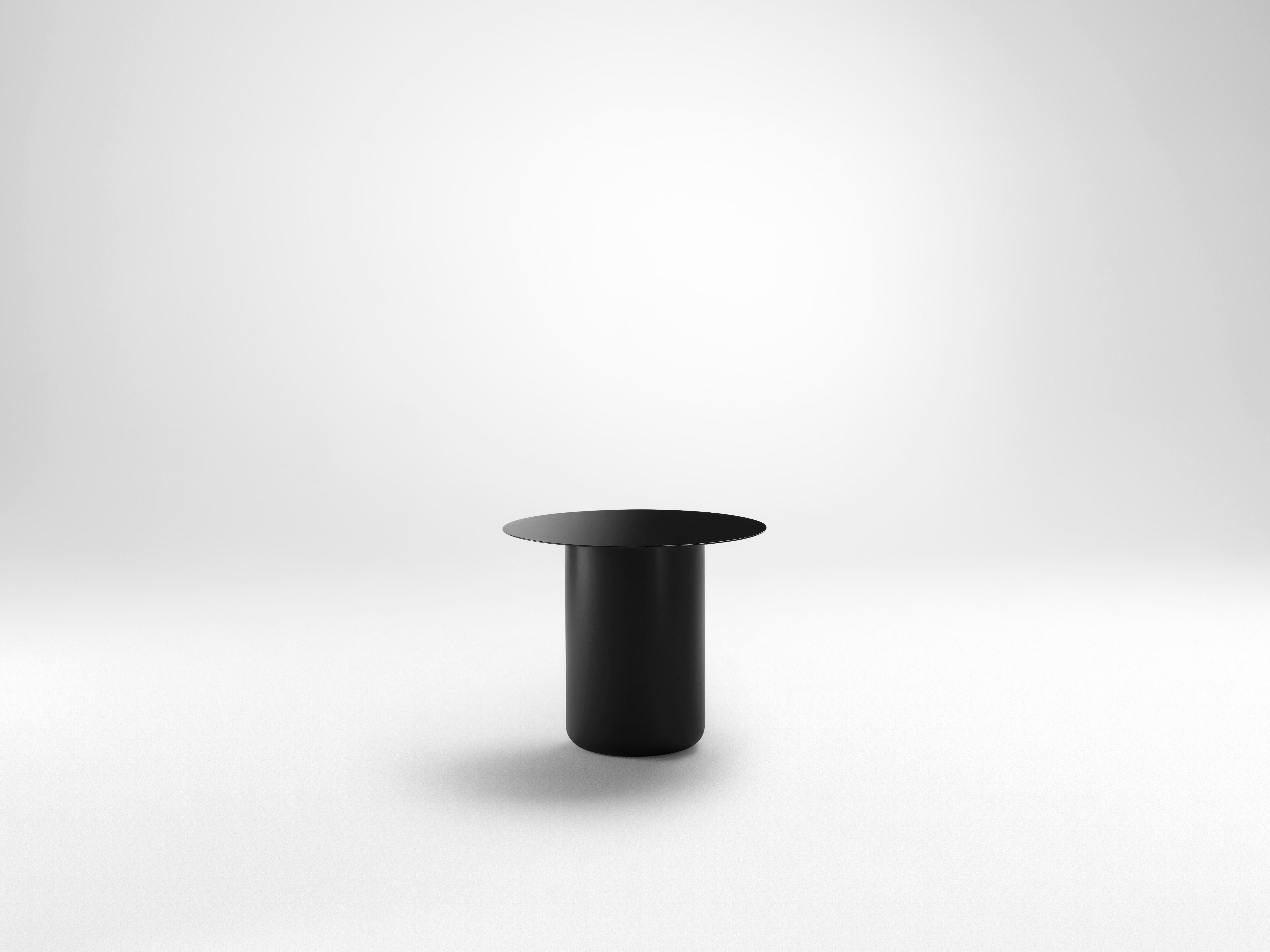 Black Table 01 by Coco Flip
Dimensions: D 48 x W 48 x H 32 / 36 / 40 / 42 cm
Materials: Mild steel, powder-coated with zinc undercoat. 
Weight: 12kg

Coco Flip is a Melbourne based furniture and lighting design studio, run by us, Kate Stokes and