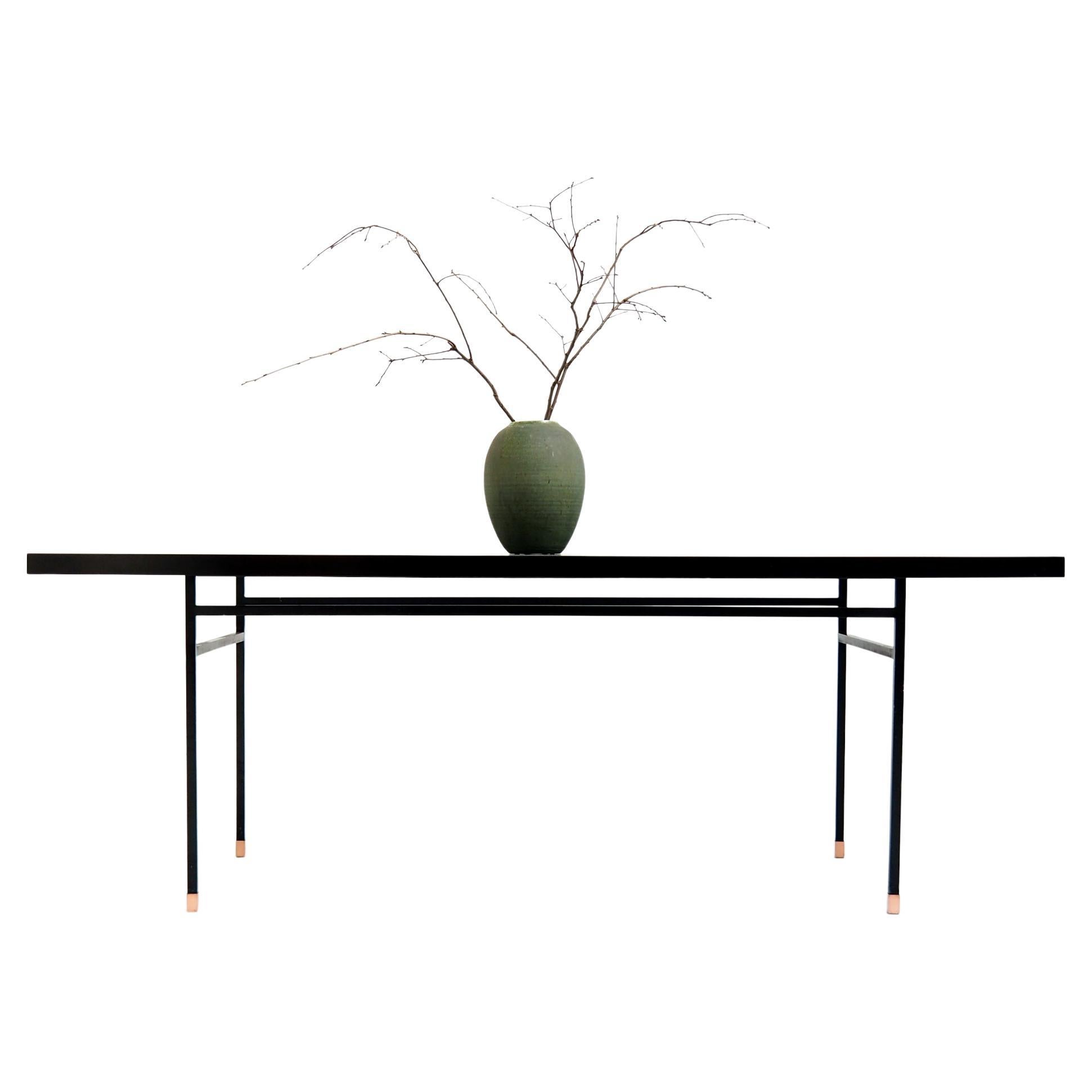 Table noire attribuée au designer moderniste français Paul Geoffroy en vente