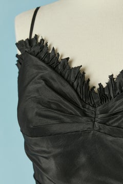 Black taffetas cocktail dress with ruffles Bellville Sassoon Lorcan Mullany